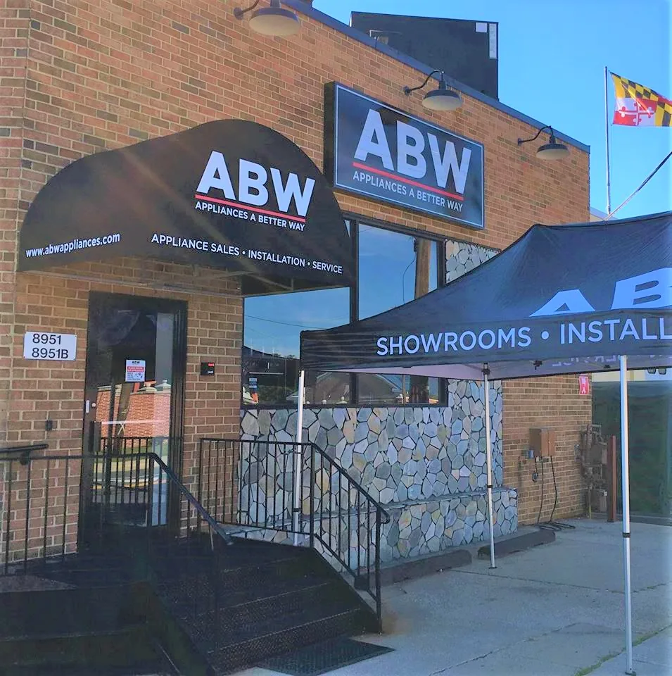 Exterior business lettering and roadside identification at an existing commercial property
